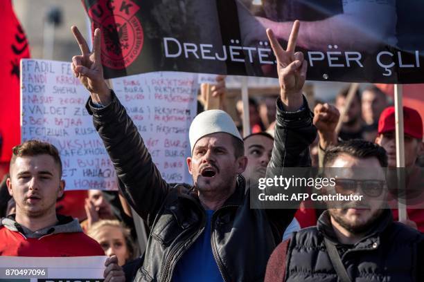 Macedonian Albanians gather in Skopje on November 5 to protest against the verdict of people convicted for plotting attacks and clashing with the...