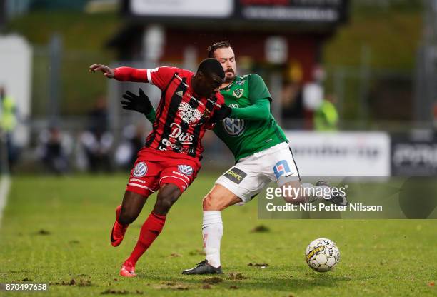 Ken Sema of Ostersunds FK and Fredric Fendrich of Jonkopings Sodra competes for the ball during the Allsvenskan match between Jonkopings Sodra IF and...