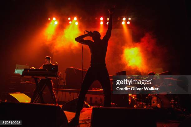 Andy Morin, Stefan Burnett, and Zach Hill of Death Grips perform at Hollywood Palladium on November 4, 2017 in Los Angeles, California.