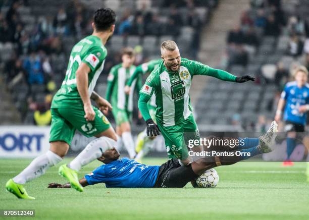 Aboubakar Keita of Halmstad BK and Sander Svendsen of Hammarby IF during the Allsvenskan match between Hammarby IF and Halmstad BK at Tele2 Arena on...