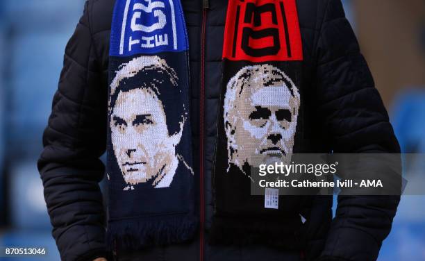 Fan wearing a scarf with the faces of Antonio Conte manager / head coach of Chelsea and Jose Mourinho the head coach / manager of Manchester United...