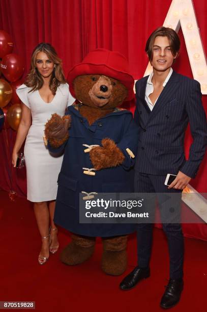 Elizabeth Hurley, Paddington Bear and Damian Hurley attend the World Premiere of "Paddington 2" at Odeon Leicester Square on November 5, 2017 in...