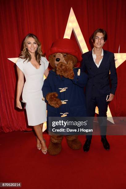 Elizabeth Hurley, Paddington Bear and Damian Hurley attend the 'Paddington 2' premiere at Odeon Leicester Square on November 5, 2017 in London,...