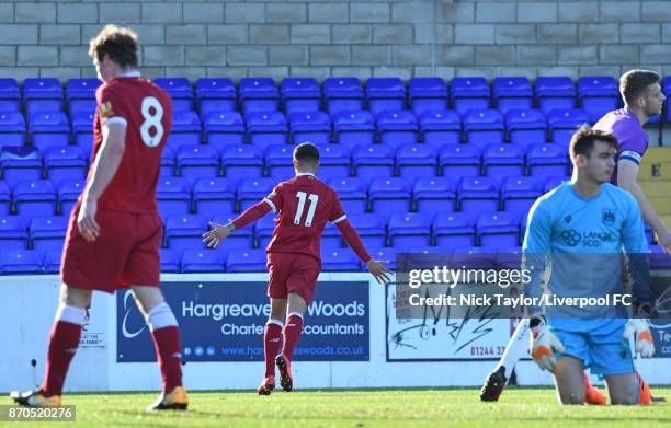 Yan Dhanda of Liverpool celebrates scoring during the U23 Premier League Cup between Liverpool and Bristol City at The Swansway Chester Stadium on...