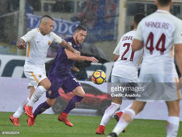 Radja Nainggolan of AS Roma in action against Jordan Veretout of ACF Fiorentina during Italian Serie A match between ACF Fiorentina and AS Roma at...