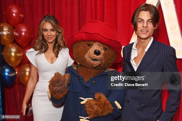 Elizabeth Hurley, Paddington Bear and Damian Hurley attend the World Premiere of "Paddington 2" at Odeon Leicester Square on November 5, 2017 in...
