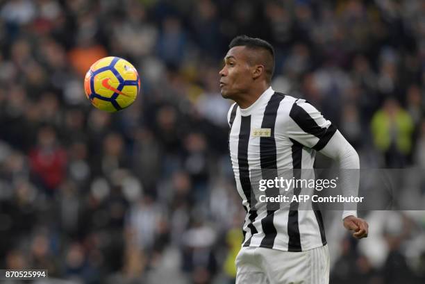 Juventus' Brazilian defender Alex Sandro Lobo Silva controls the ball during the Italian Serie A football match Juventus vs Benevento at the Juventus...