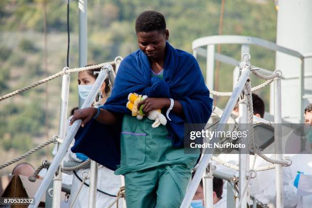 Migrants disembark from the Spanish ship 'Cantabria' in the harbour of Salerno, Italy, 05 November 2017. Spanish Navy ship rescued on 03 November...