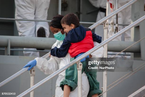 Migrants disembark from the Spanish ship 'Cantabria' in the harbour of Salerno, Italy, 05 November 2017. Spanish Navy ship rescued on 03 November...