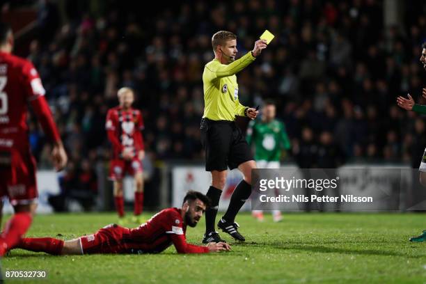 Glenn Nyberg, referee shows a yellow card during the Allsvenskan match between Jonkopings Sodra IF and Ostersunds FK at Stadsparksvallen on November...