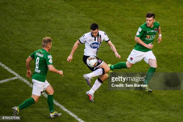 Dublin , Ireland - 5 November 2017; Michael Duffy of Dundalk in action against Conor McCormack and Steven Beattie of Cork City during the Irish Daily...