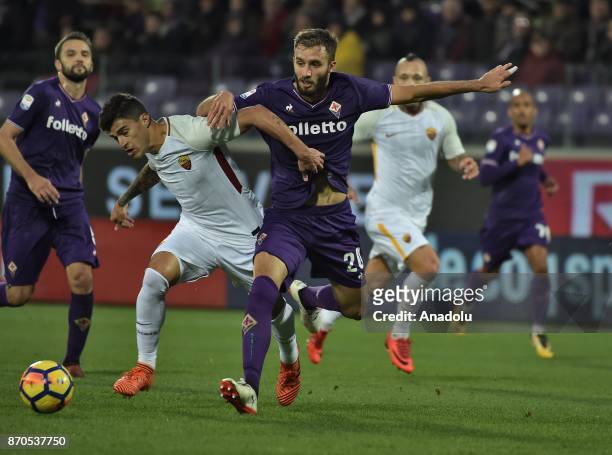 Diego Perotti of AS Roma in action against German Pezzella of ACF Fiorentina during Italian Serie A match between ACF Fiorentina and AS Roma at...