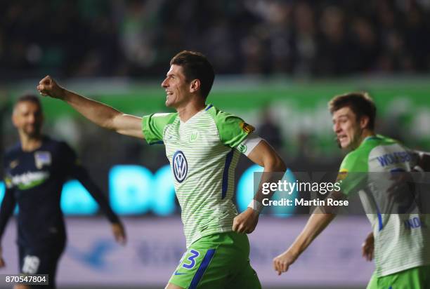 Mario Gomez of Wolfsburg celebrates a goal which is later disallowed following a video assistant referee decision during the Bundesliga match between...