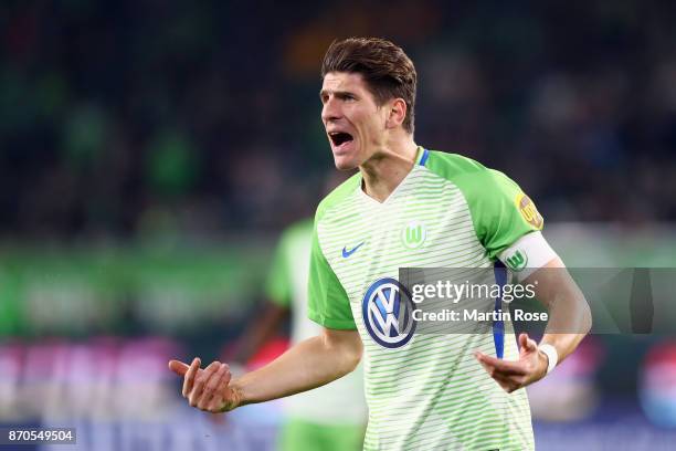 Mario Gomez of Wolfsburg reacts after his goal was disallowed following a video assistant referee decision during the Bundesliga match between VfL...