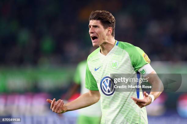 Mario Gomez of Wolfsburg reacts after his goal was disallowed following a video assistant referee decision during the Bundesliga match between VfL...