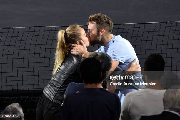 Jack Sock of the United States kises his girlfriend Michela Burns after winning the men's singles final match against Filip Krajinovic of Serbia...