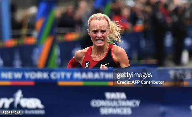 Shalane Flanagan of the US runs to the finish line to win the Women's Division during the 2017 TCS New York City Marathon in New York on November 5,...