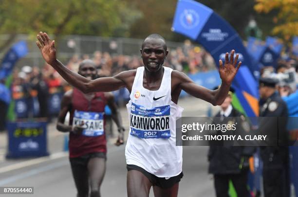 Geoffrey Kamworor of Kenya crosses the finish line to win the Men's Division during the 2017 TCS New York City Marathon in New York on November 5,...