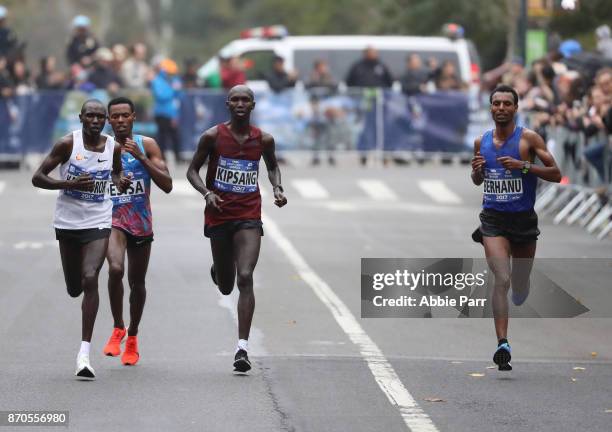 Geoffrey Kamworor of Kenya, Lelisa Desisa of Ethiopia, Wilson Kipsang of Kenya, and Lemi Berhanu of Ethiopia lead the field of the Professional Men's...