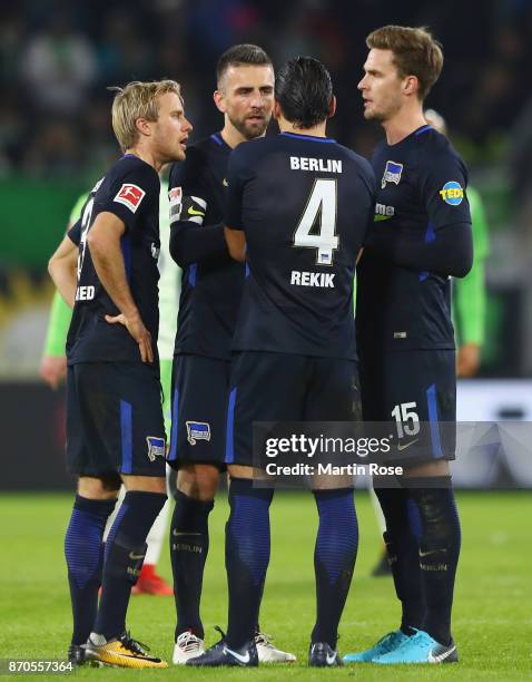 Per Skjelbred, Vedad Ibisevic, Karim Rekik and Sebastian Langkamp of Berlin discuss during the Bundesliga match between VfL Wolfsburg and Hertha BSC...