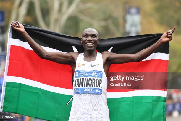 Geoffrey Kamworor of Kenya celebrates winning the Professional Men's Division during the 2017 TCS New York City Marathon in Central Park on November...