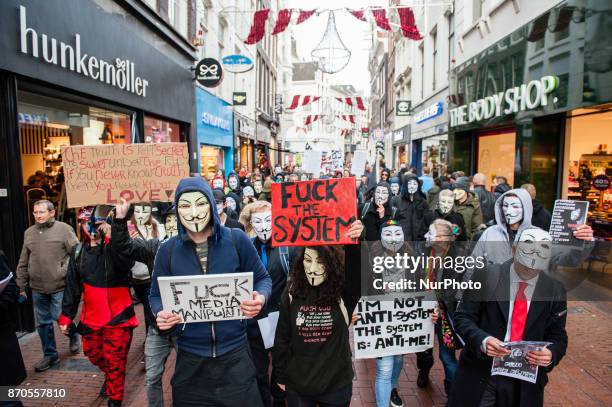 Anonymous-inspired activists are taking to the streets of Amsterdam on November 5, as part of a global movement. Hiding behind symbolic Anonymous...