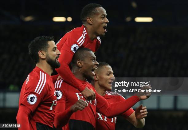 Watford's Zairean defender Christian Kabasele celebrates scoring his team's second goal during the English Premier League football match between...