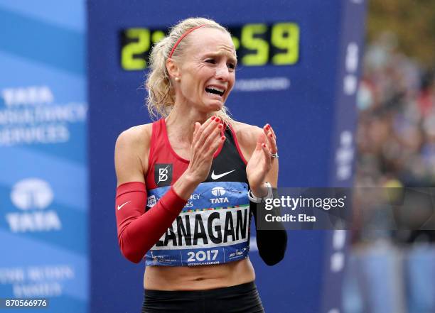 Shalane Flanagan of the United States celebrates winning the Professional Women's Division during the 2017 TCS New York City Marathon in Central Park...