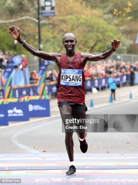 Wilson Kipsang of Kenya celebrates as he crosses the finish line in second place in the Professional Men's division during the TCS New York City...