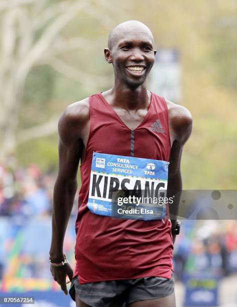 Wilson Kipsang of Kenya celebrates as he crosses the finish line in second place in the Professional Men's division during the TCS New York City...