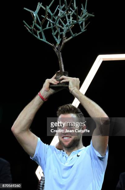 Jack Sock of USA holds the trophy following his victory in final against Filip Krajinovic of Serbia on day 7 of the Rolex Paris Masters 2017, a...