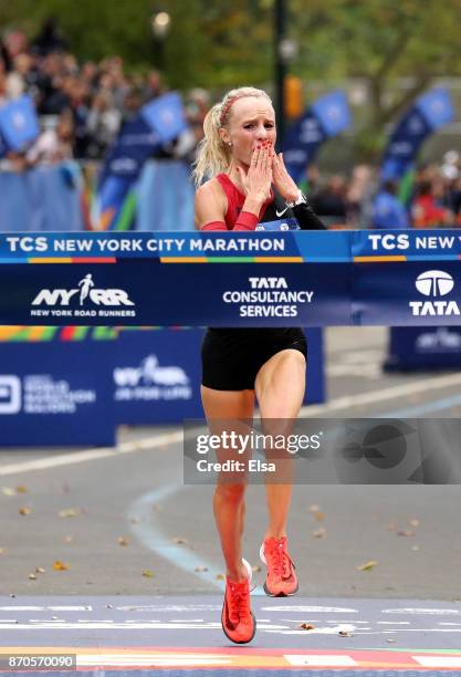 Shalane Flanagan of the United States celebrates winning the Professional Women's Division during the 2017 TCS New York City Marathon in Central Park...