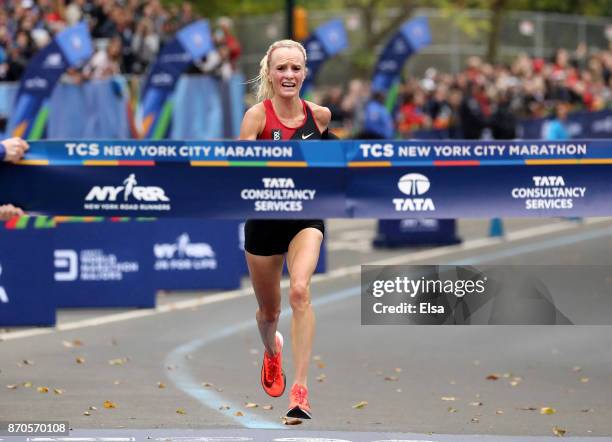 Shalane Flanagan of the United States celebrates winning the Professional Women's Division during the 2017 TCS New York City Marathon in Central Park...