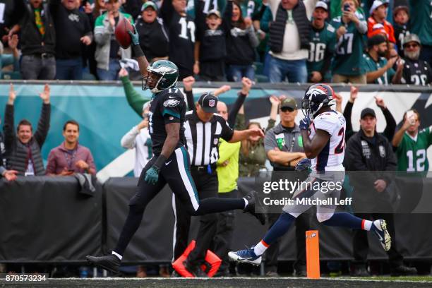 Wide receiver Alshon Jeffery of the Philadelphia Eagles scores a touchdown against free safety Darian Stewart of the Denver Broncos during the first...