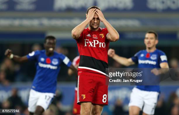 Tom Cleverley of Watford reacts to missing a penalty during the Premier League match between Everton and Watford at Goodison Park on November 5, 2017...