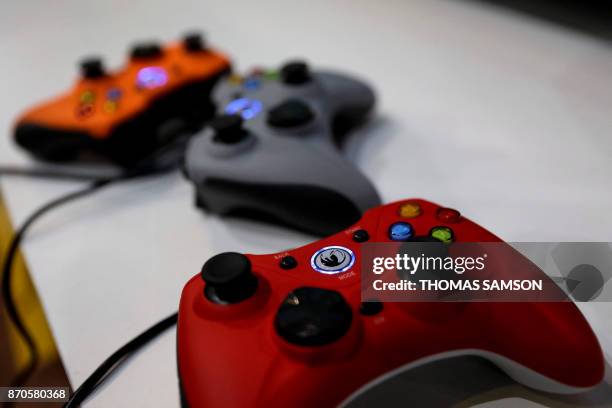 Microsoft Xbox controllers are displayed during the 2017 Paris Games Week exhibition at the Porte de Versailles exhibition centre in Paris.