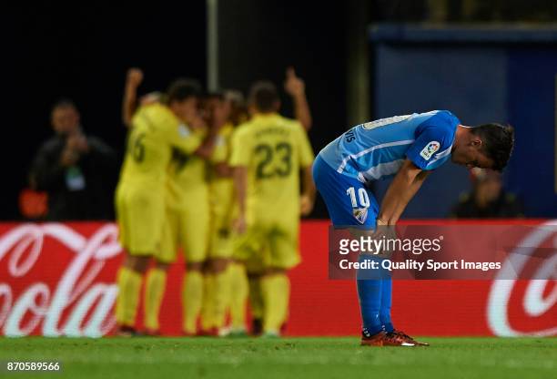 Juan Pablo Anor of Malaga reacts after Villarreal CF scoring a goal during the La Liga match between Villarreal and Malaga at Estadio De la Ceramica...