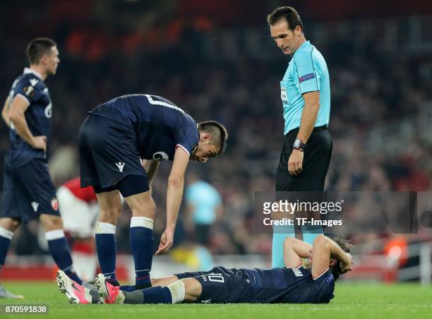 Filip Stojkovic of Red Star Belgrade on the ground during UEFA Europa League Group H match between Arsenal and Red Star Belgrade at The Emirates ,...