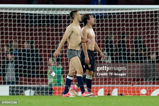 Marko Gobeljic of Red Star Belgrade goes without a jersey and pants with Filip Stojkovic of Red Star Belgrade during UEFA Europa League Group H match...