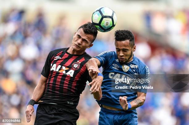 Rafinha of Cruzeiro and Lucas Fernandes of Atletico PR battle for the ball during a match between Cruzeiro and Atletico PR as part of Brasileirao...