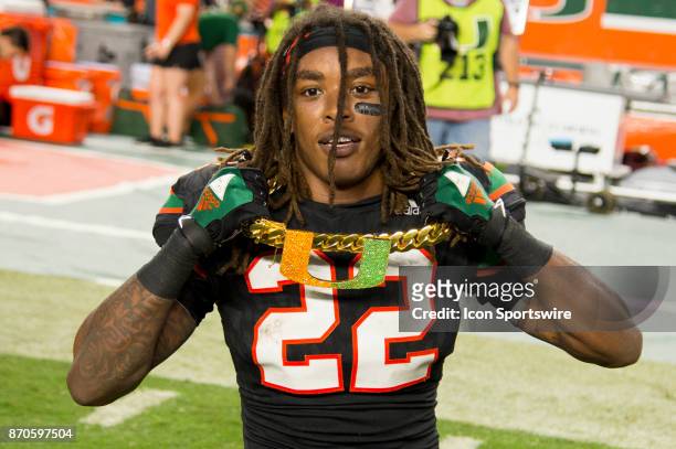 University of Miami Hurricanes Defensive Back Sheldrick Redwine celebrates with the UM "Turnover Chain" after intercepting a pass from Virginia Tech...
