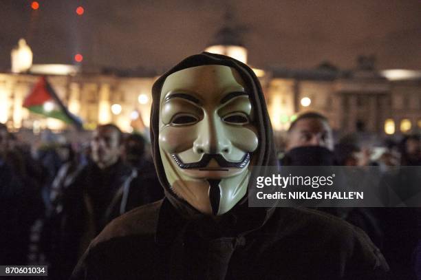 Anti-capitalist demonstrators gather in Trafalgar Square during the 'Million Masks March', organised by the group Anonymous, in London on November 5,...