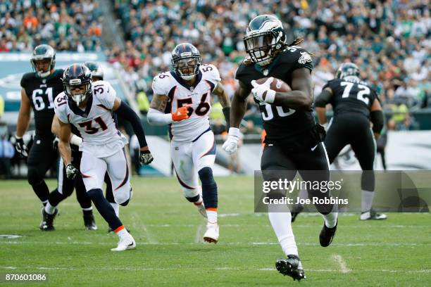 Running back Jay Ajayi of the Philadelphia Eagles runs the ball 46 yards for a touchdown against the Denver Broncos during the second quarter at...