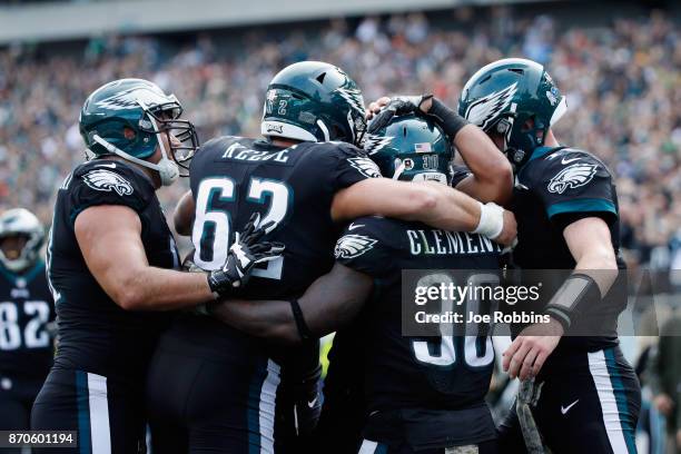 Tight end Trey Burton of the Philadelphia Eagles celebrates his touchdown with teammates against the Denver Broncos during the second quarter at...