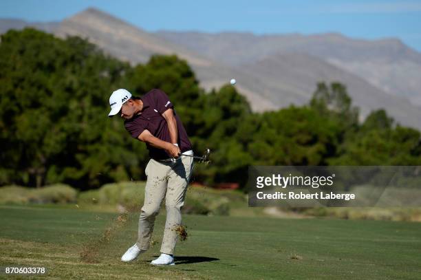 John Huh hits his approach shot on the first hole during the final round of the Shriners Hospitals For Children Open at the TPC Summerlin on November...