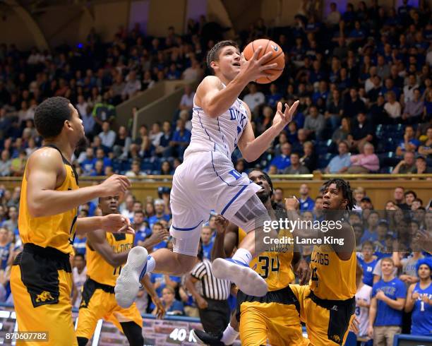 Grayson Allen of the Duke Blue Devils goes to the basket against the Bowie State Bulldogs at Cameron Indoor Stadium on November 4, 2017 in Durham,...