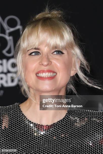 Cecile Cassel aka Hollysiz arrives at the 19th NRJ Music Awards ceremony at the Palais des Festivals on November 4, 2017 in Cannes, France.