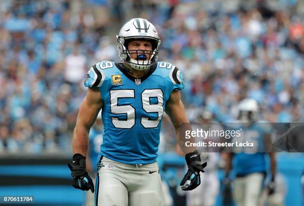 Luke Kuechly of the Carolina Panthers reacts after a play against the Atlanta Falcons in the fourth quarter during their game at Bank of America...