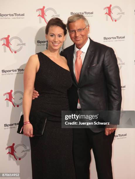 Wolfgang Bosbach and his daughter pose at the 10th anniversary celebration of the Sports Total Agency on November 5, 2017 in Cologne, Germany.