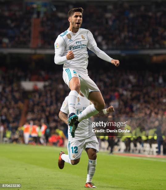 Marco Asensio of Real Madrid CF celebrates after scoring his team's 2nd goal during the La Liga match between Real Madrid and Las Palmas at Estadio...